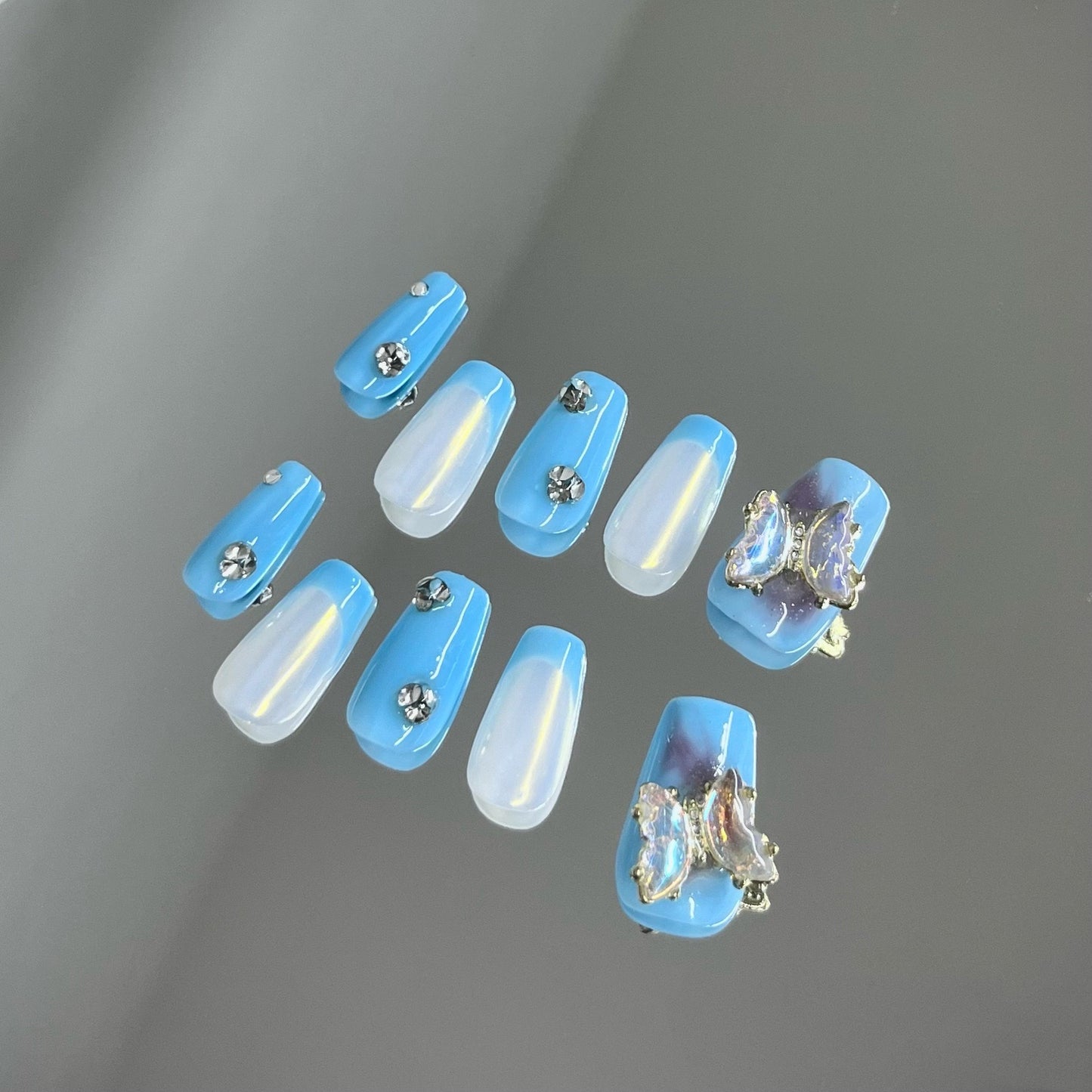 Royal Blue Nails With Butterflies