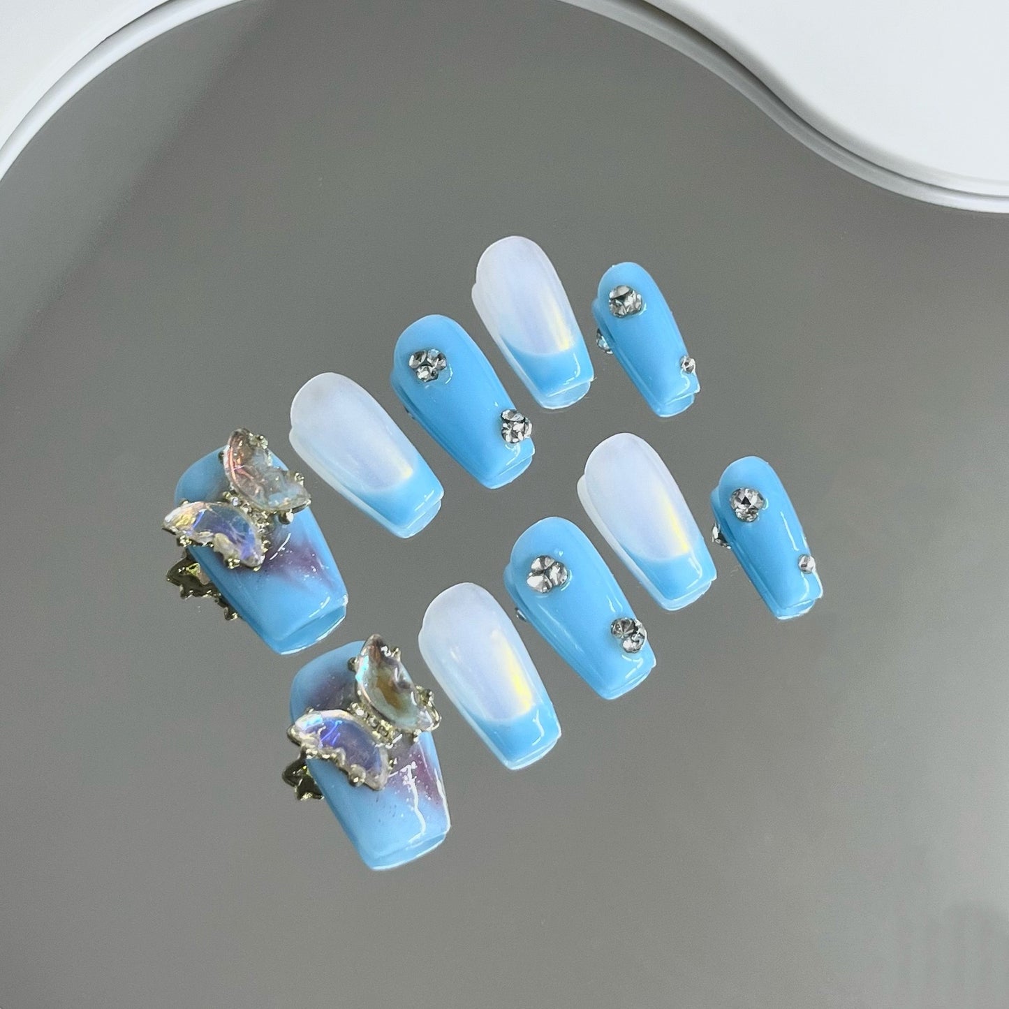 Royal Blue Nails With Butterflies