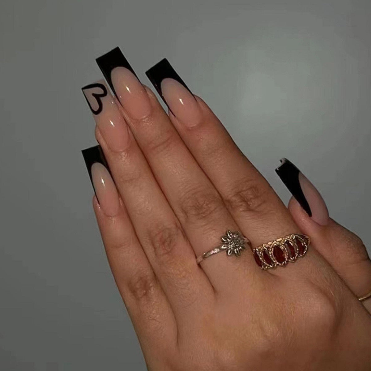 pink nails with black tips