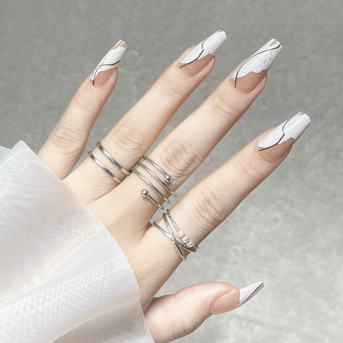 white swirl nails coffin