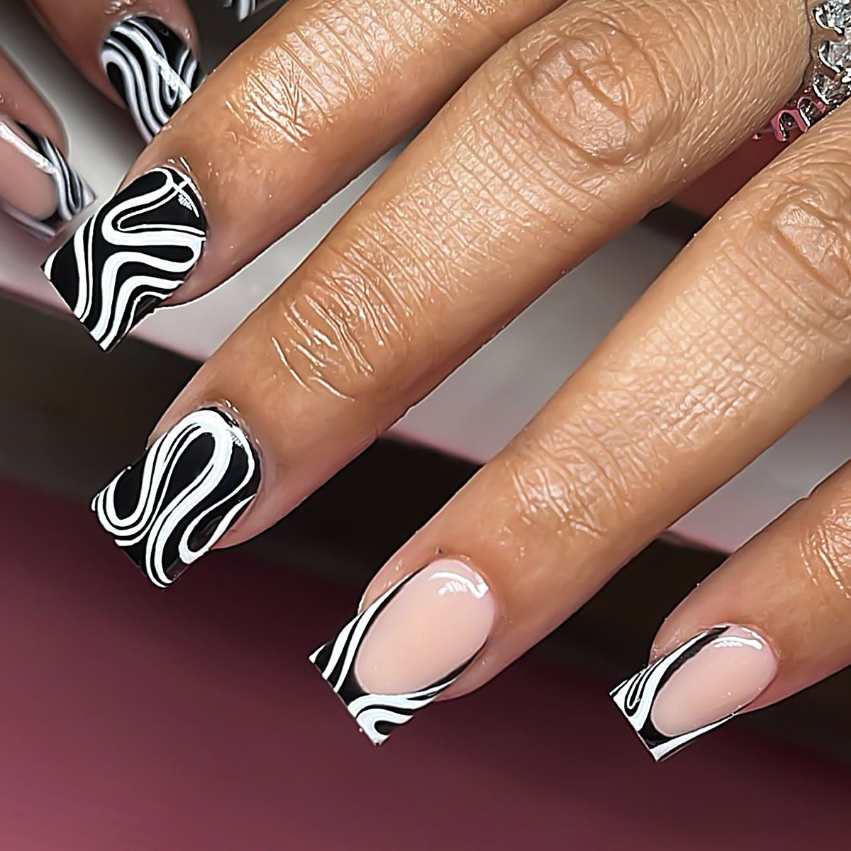 black and white swirl nails