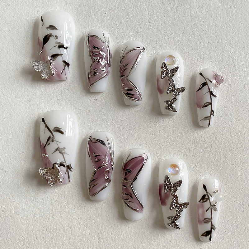 Baddie White Nails With Butterflies