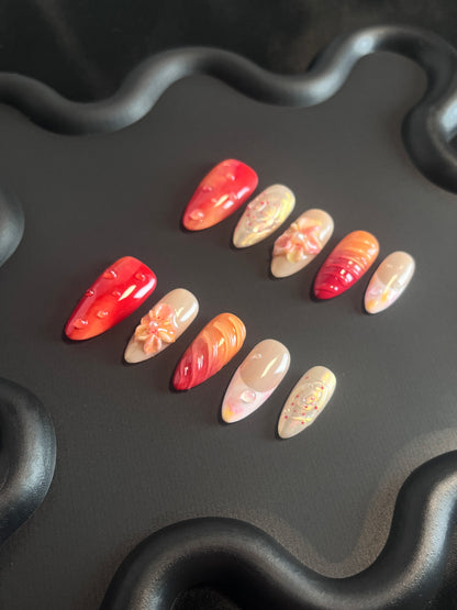 Sunset Flower Almond Red Ombre Nails