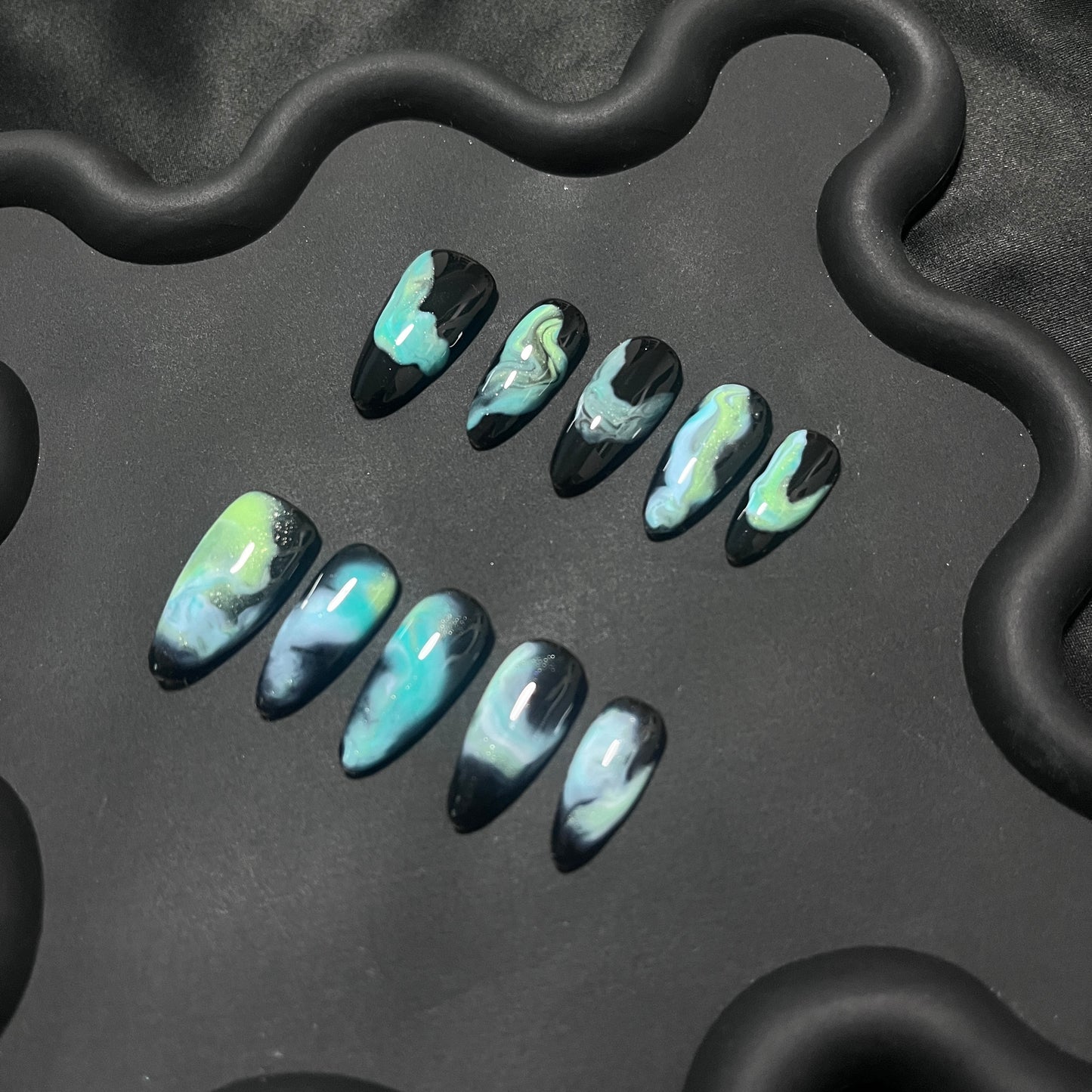 Teal Nebula Almond Ombre Nails