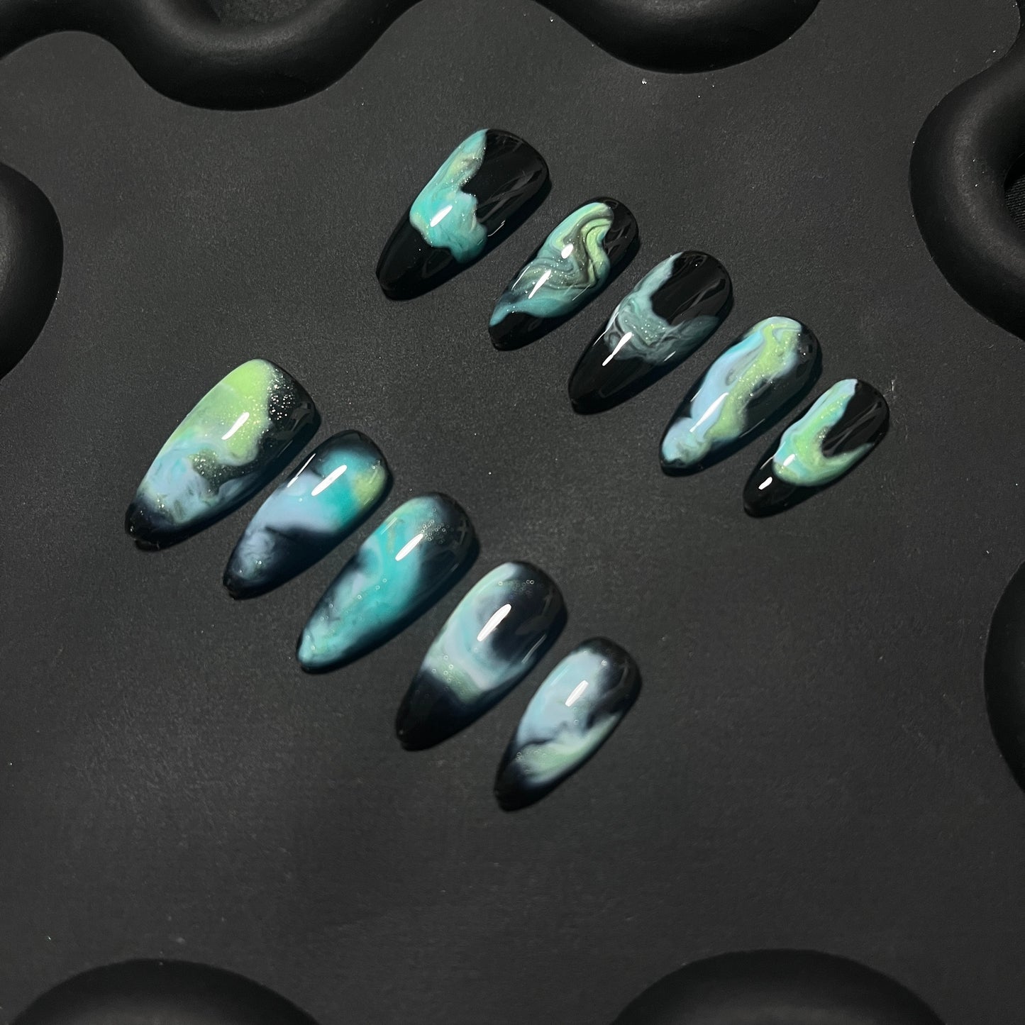 Teal Nebula Almond Ombre Nails