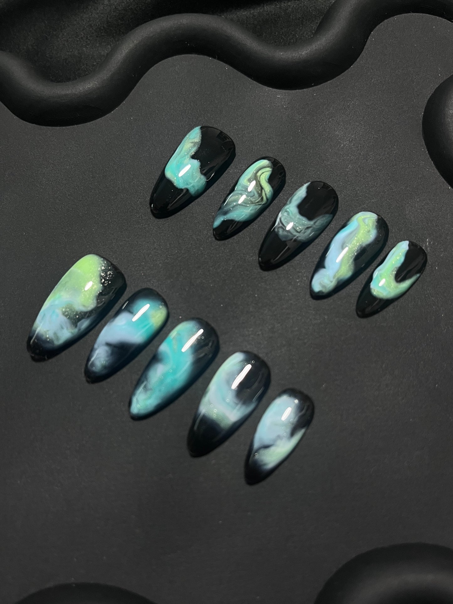 Teal Nebula Almond Ombre Nails