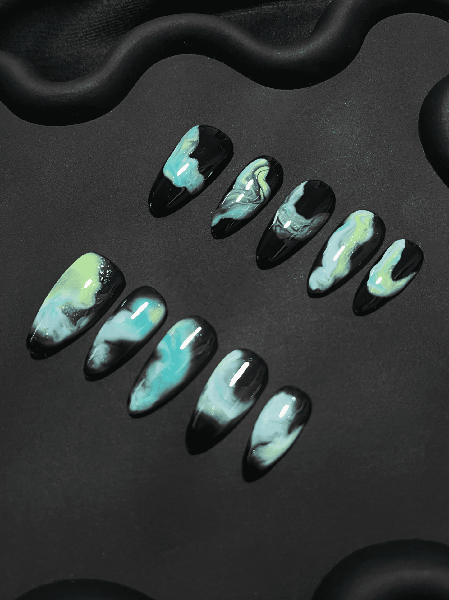 Teal Nebula Almond Ombre Nails