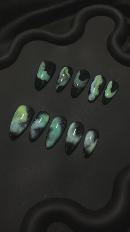 Teal Nebula Almond Ombre Nails