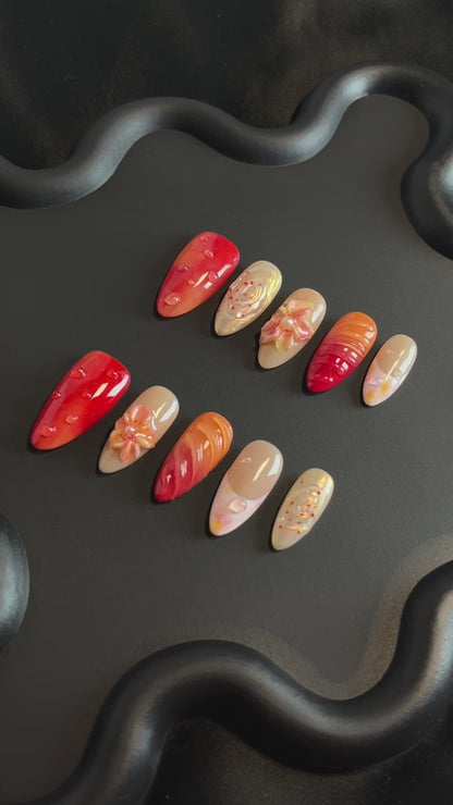 Sunset Flower Almond Red Ombre Nails